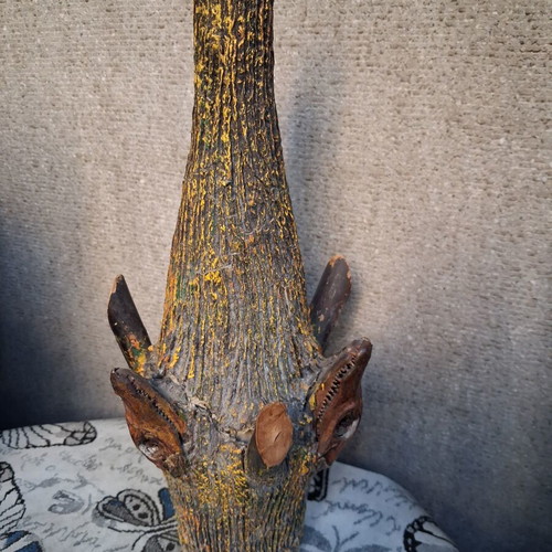 Vintage decorative glass bottle with animal heads, handmade folk art