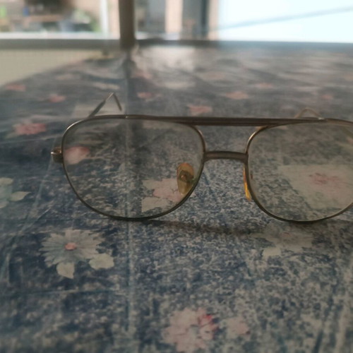 Ray-Ban vintage frame with lenses like new, gold color