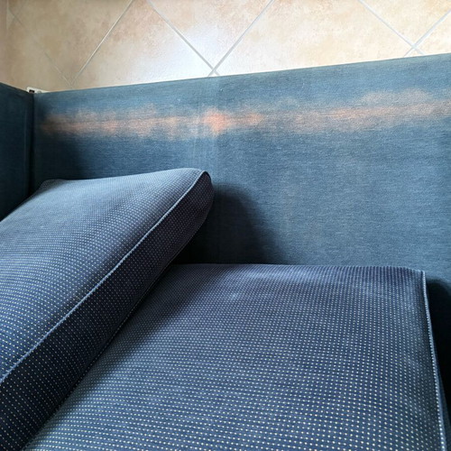 Two dark blue used two-seater sofas set