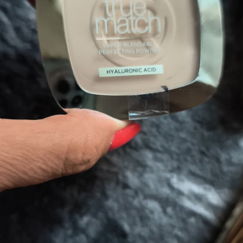 L'Oréal makeup set with mascara, powder, lipstick