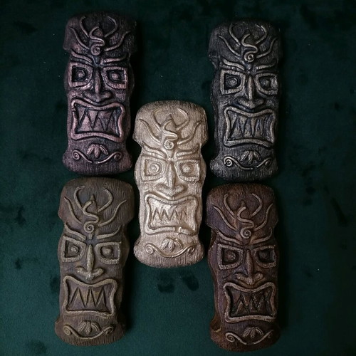 Handmade gypsum magnets and hanging totems painted with acrylics