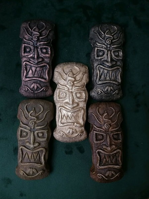 Handmade gypsum magnets and hanging totems painted with acrylics