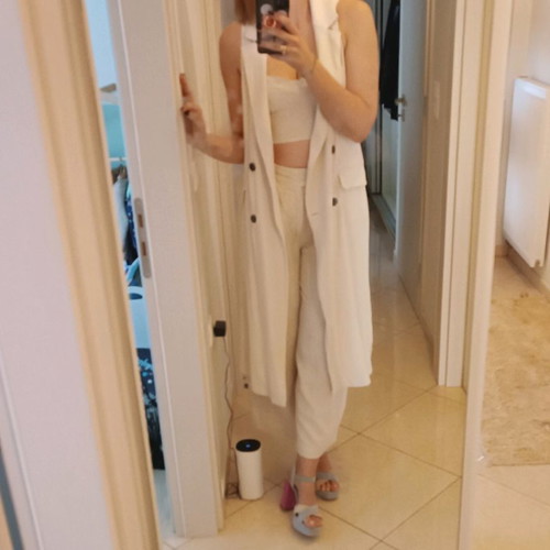Women's set like new with beige crop bustier, vest and trousers