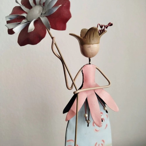 Metal decorative figurine like new with painted details