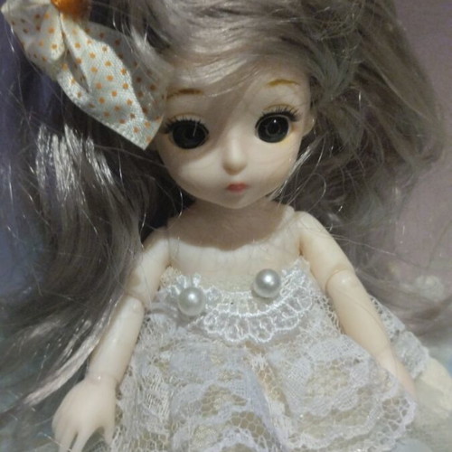 B.J.D Doll keychain with gray silver hair like new