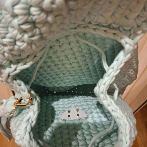 Knitted bagpack like new, turquoise