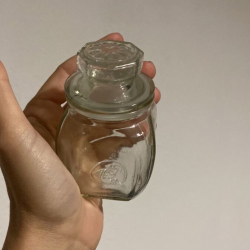 Vintage glass jar with embossed lid like new