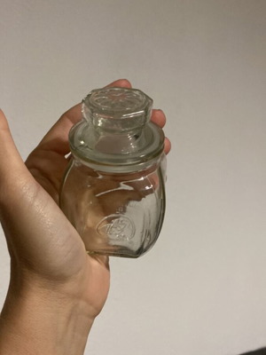 Vintage glass jar with embossed lid like new