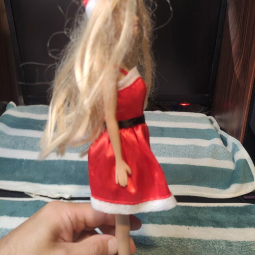 Doll dressed as Santa Claus used