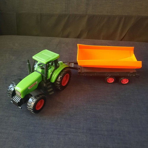 Toy tractor with trailer like new, fully functional