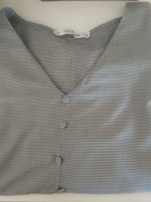 Parabita XXL blouse with decorative buttons like new, black and white