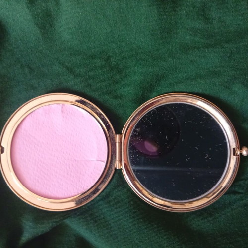 Compact mirror with gold-tone metal case and butterfly decoration, like new
