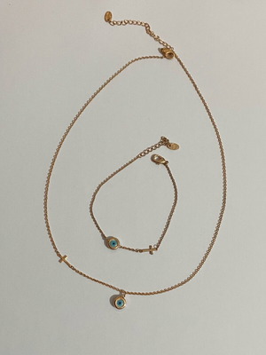 Necklace and bracelet set with cross and evil eye like new, blue and gold