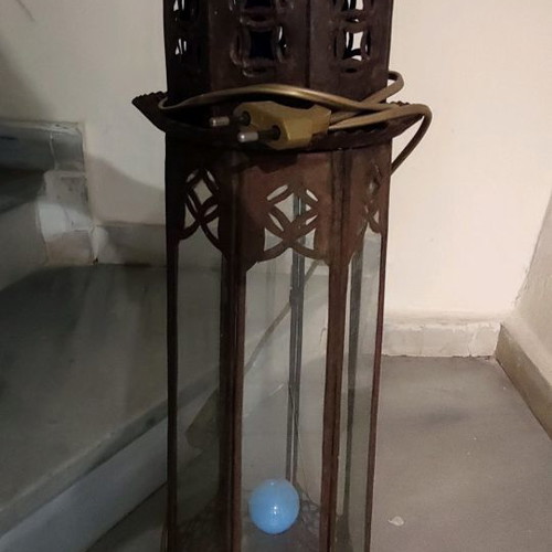 Metal vintage decorative garden lantern used with blue lighting