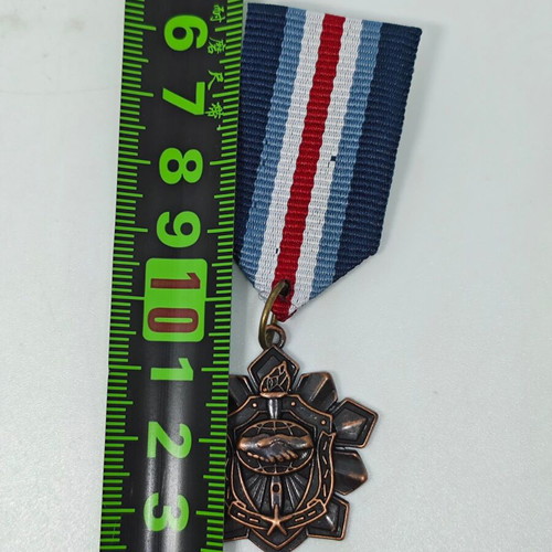 Collectible replica peace and friendship medal like new