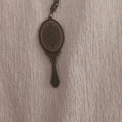 Vintage necklace with hand mirror used, bronze, bow and phone element