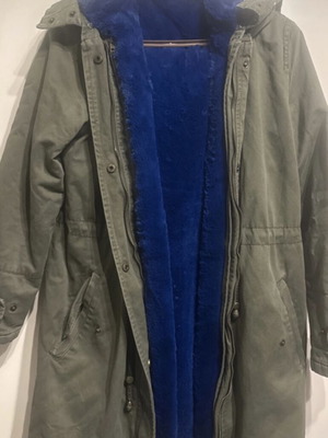 Khaki jacket with blue inner fur lining and hood