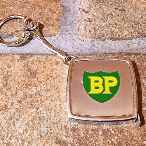 BP vintage keychain tape measure used