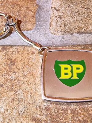 BP vintage keychain tape measure used