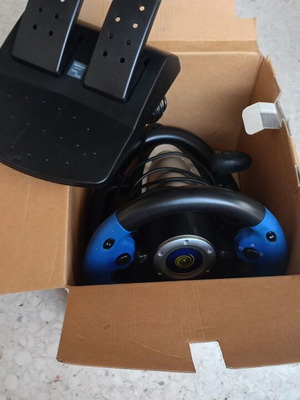 Steering wheel for PlayStation 2 used with signs of wear
