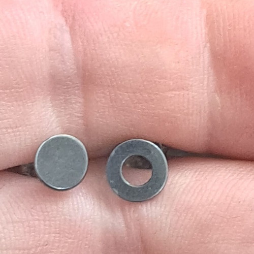 Silver asymmetric 925 studs with geometric circles, like new