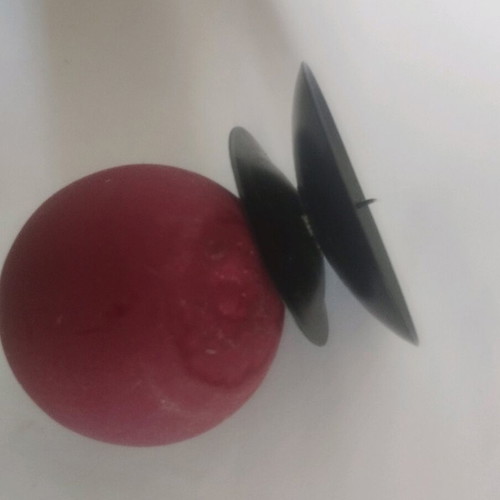 Round candle on metal black base like new