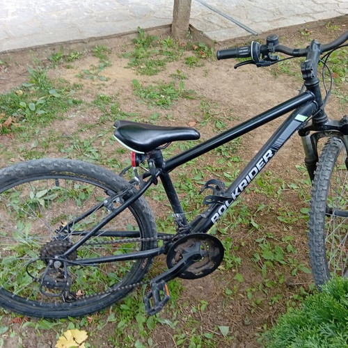 Rockrider city bike used, 24 inch wheels, V-brakes, front suspension