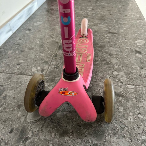Micro Mini Deluxe Led scooter used with helmet for ages 2-5