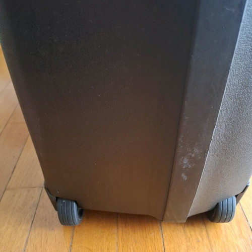 Delsey hard suitcase used, large, black with 2 wheels