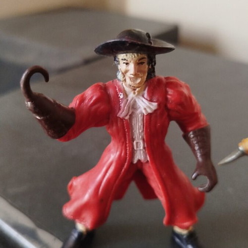 Captain Hook and a Pirate figures like new from Pirates of the Caribbean
