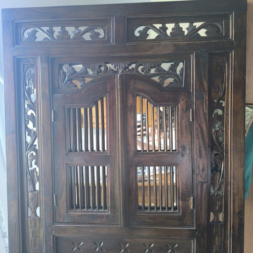 Wooden carved mirror with opening shutters like new