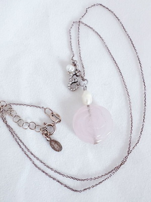 Gregio silver necklace used with rose quartz, pearls and zirconia charms