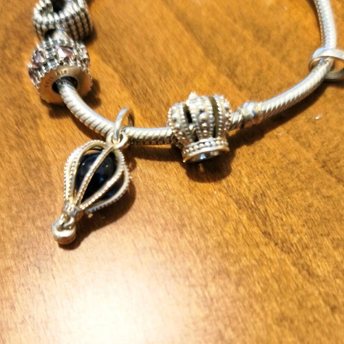 Pandora bracelet authentic used size 16 with 6 charms and safety chain