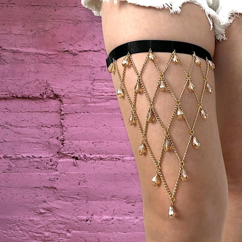 Garter new with gold chains and large crystals