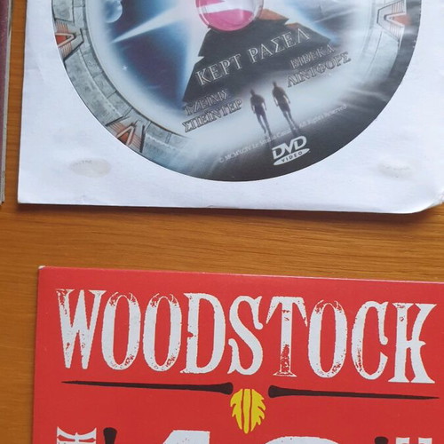 DVD pack of 55 new, 40 in hard case and 15 in paper