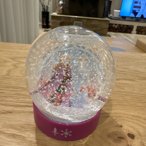 Disney snow globes Elsa and Anna like new