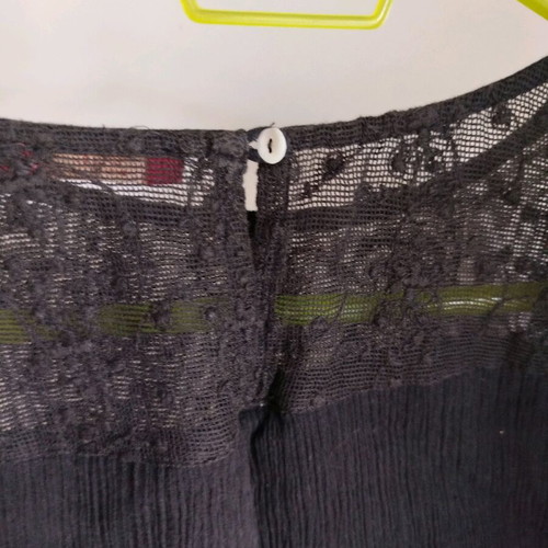 Blouse with perforated details used, size XS