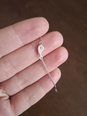 Silver bracelet with pink eye charm, like new, 925 stamp