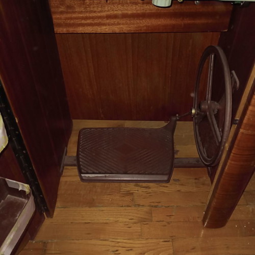 Ideal sewing machine used, foot-powered with motor, wooden cabinet
