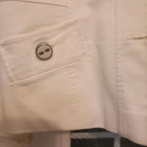 Women's jacket used white cotton with silver buttons