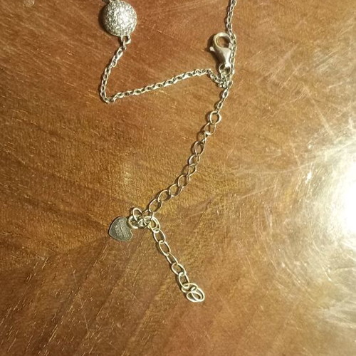Silver bracelet with stones and infinity symbol like new