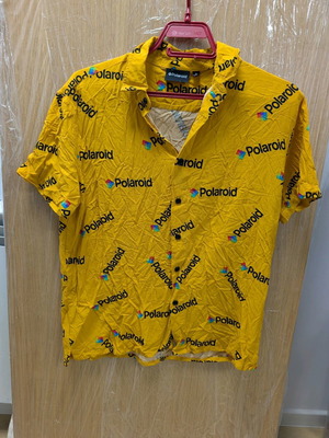 Polaroid yellow button-up shirt with logo size S like new