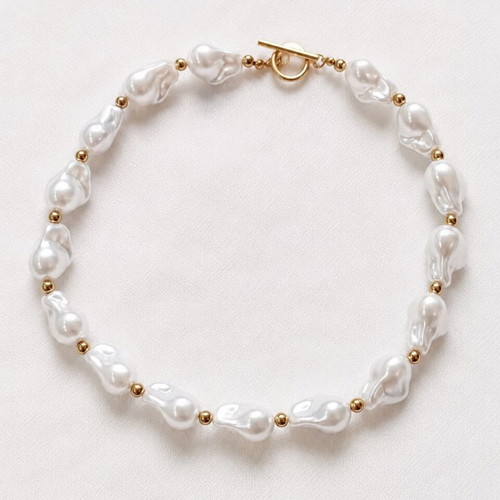 Women's bracelet with Baroque pearls and gold details