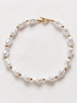 Women's bracelet with Baroque pearls and gold details