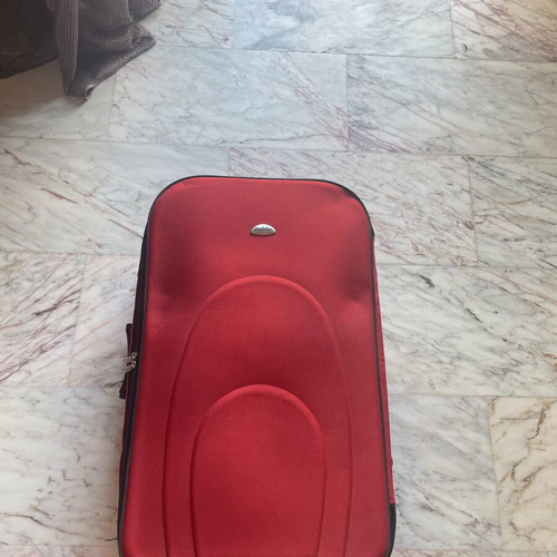 Dolphin suitcase like new, 50-65 lt, black and red