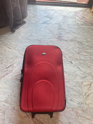 Dolphin suitcase like new, 50-65 lt, black and red