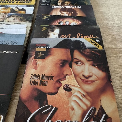 Pack of 30 DVDs with various movies