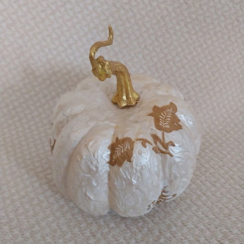 Handmade decorative pumpkin made of polystyrene with decoupage technique