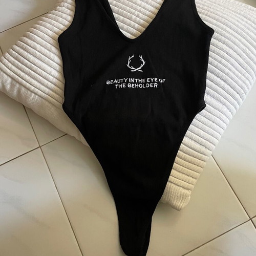 Body DZS black xs like new with very high cut