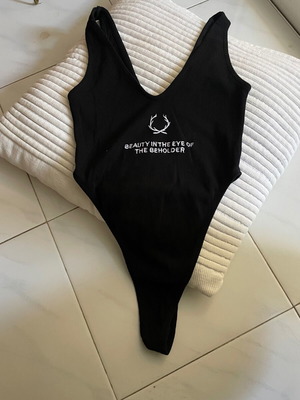 Body DZS black xs like new with very high cut